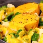 Cheesy Cauliflower and broccoli over baked potatoes.