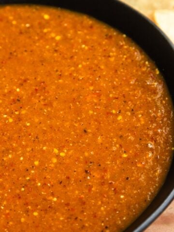 Spicy chile de arbol salsa in a bowl.