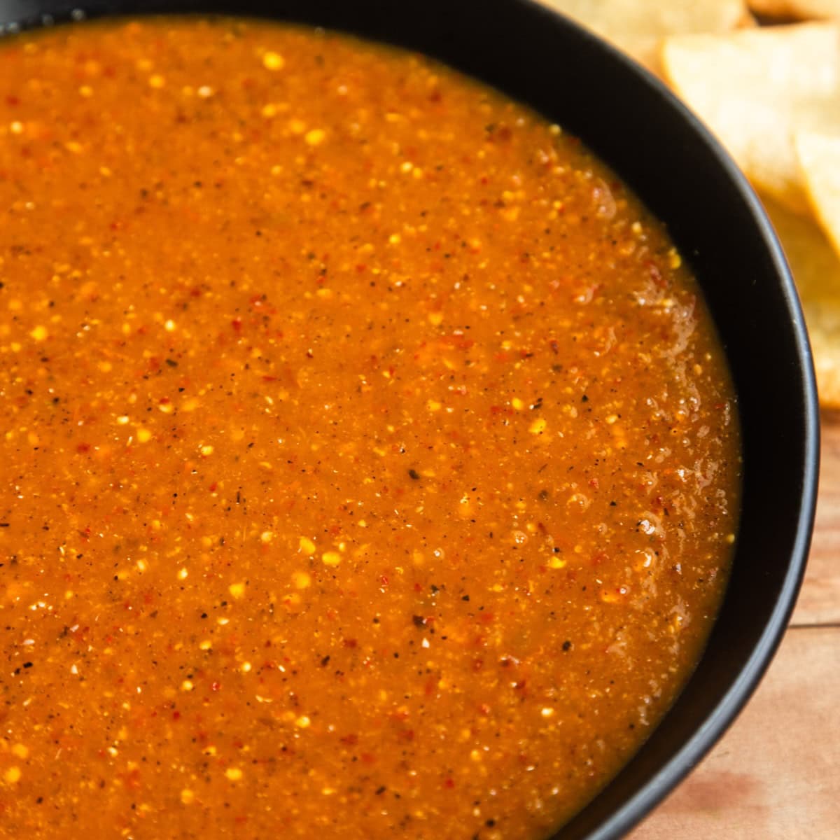 Spicy chile de arbol salsa in a bowl.