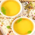 Calming herbal tea in two small bowls.