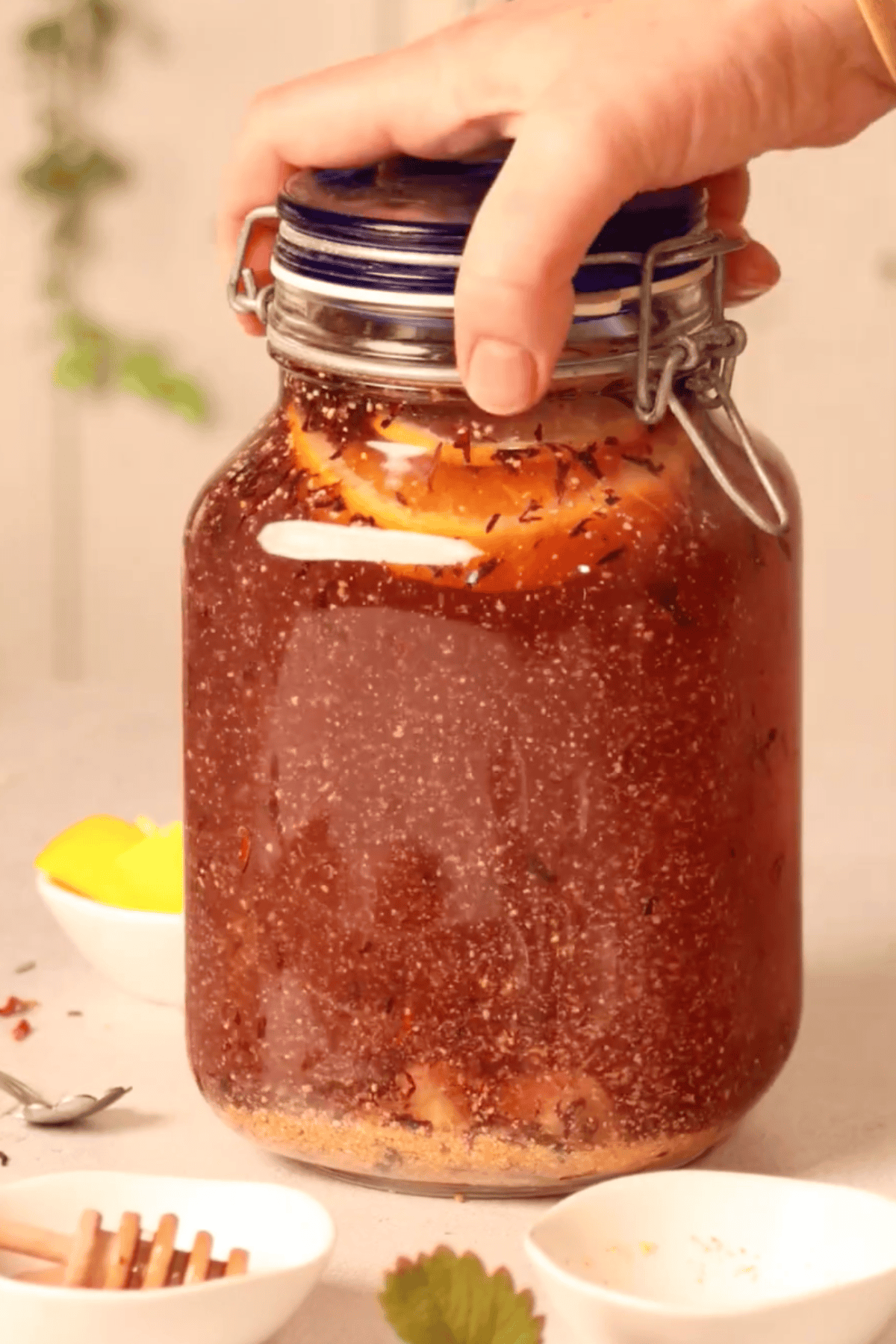 Iced hibiscus being made in an airtight container.