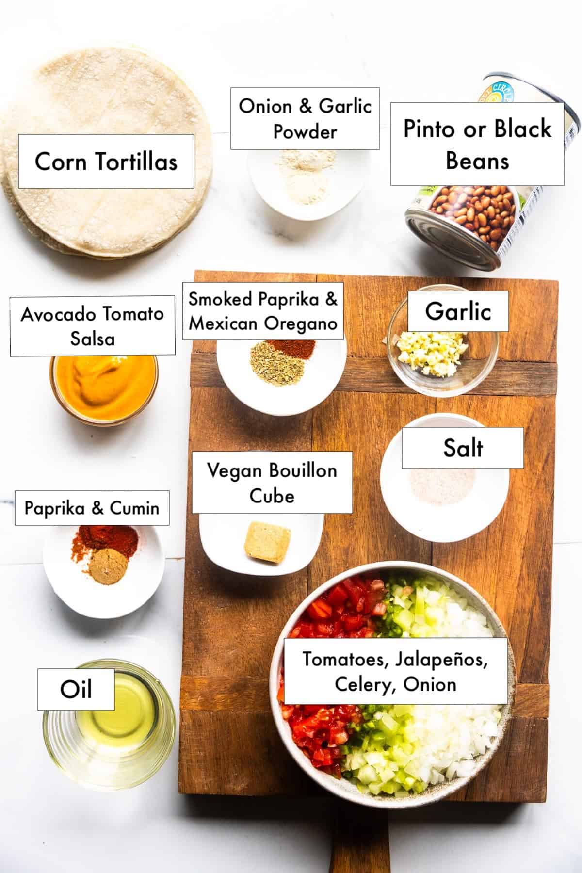 Ingredients for vegan taquitos in labeled bowls.