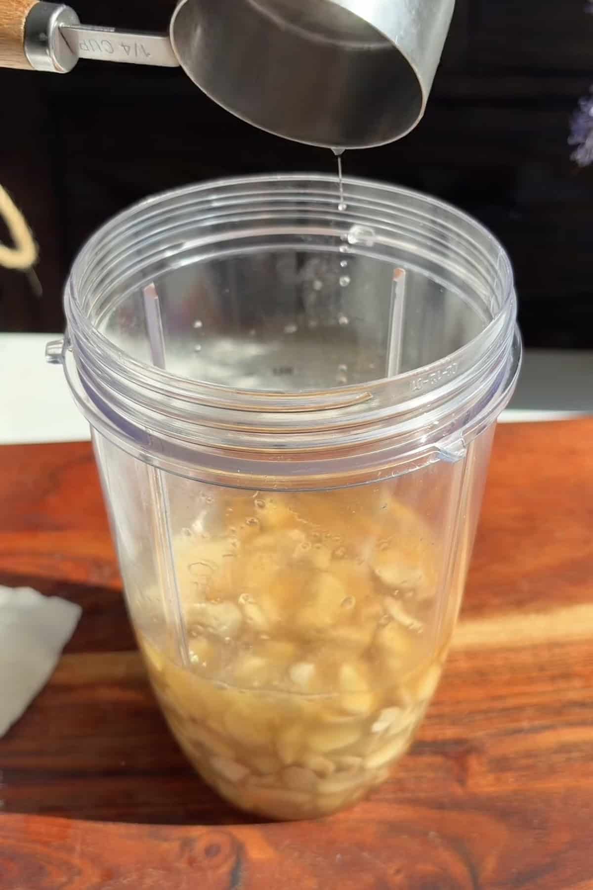 Ingredient for healthy vegan fruit dip in a blender.