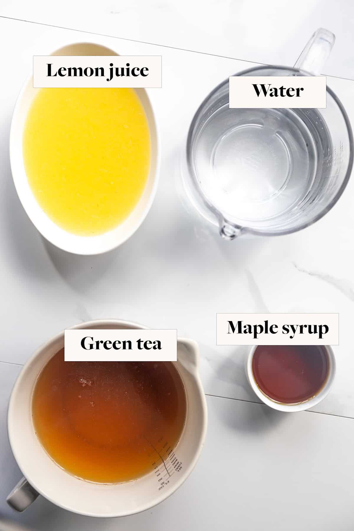 4 bowls showing lemon juice, water, green tea, and maple syrup.