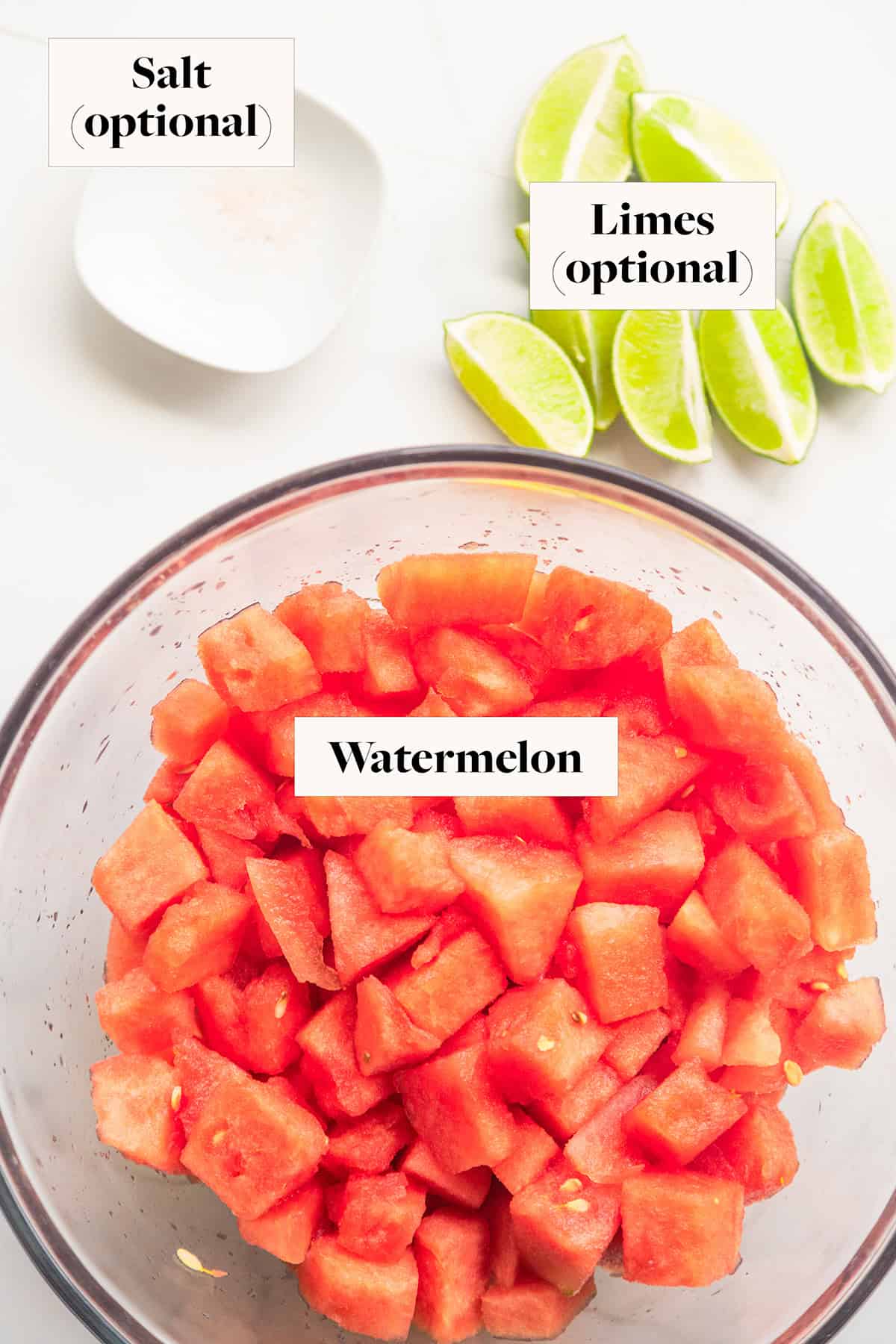 Ingredients for watermelon juice in labeled bowls.