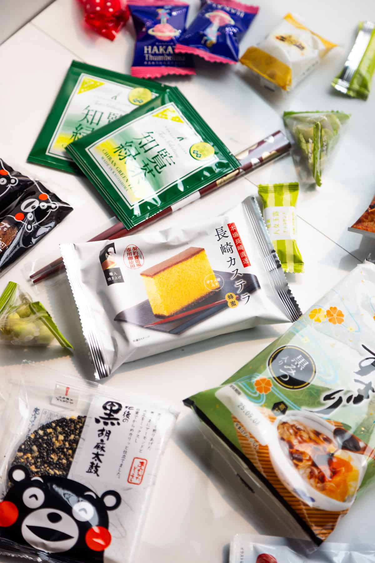 Contents of the Sakuraco snack box laid out on a table.