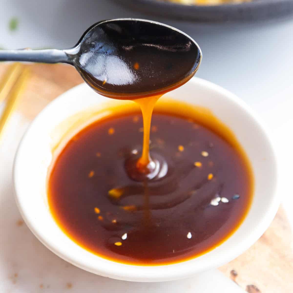 Sticky maple glaze sauce in a bowl.