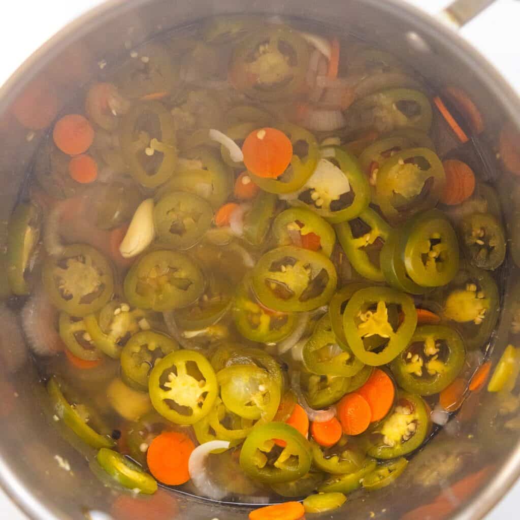 Cooked vegetables in a pot.