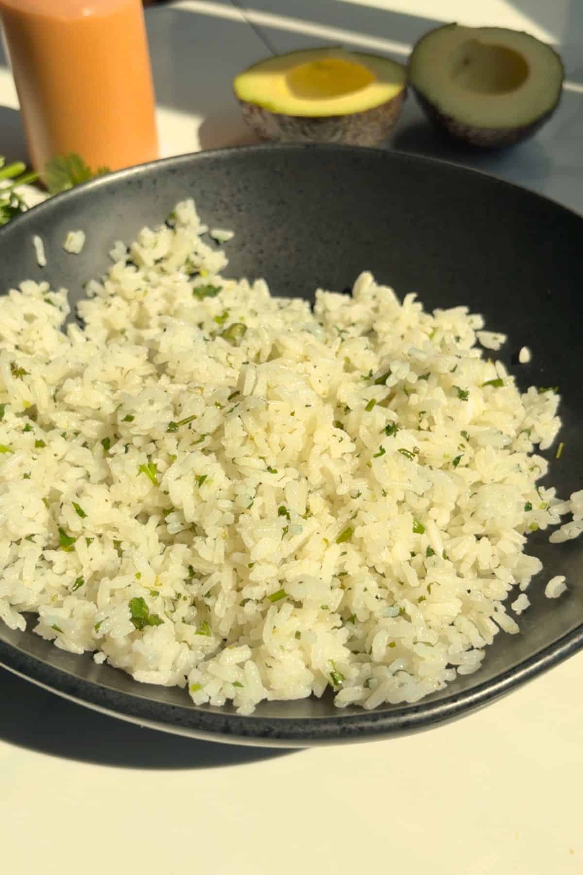 Cooked white rice in a bowl.