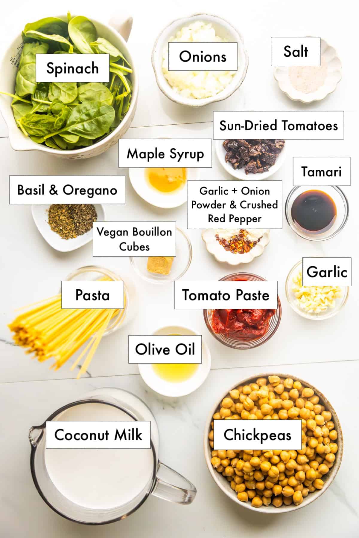 Ingredients for marry me chickpeas with pasta in labeled bowls.