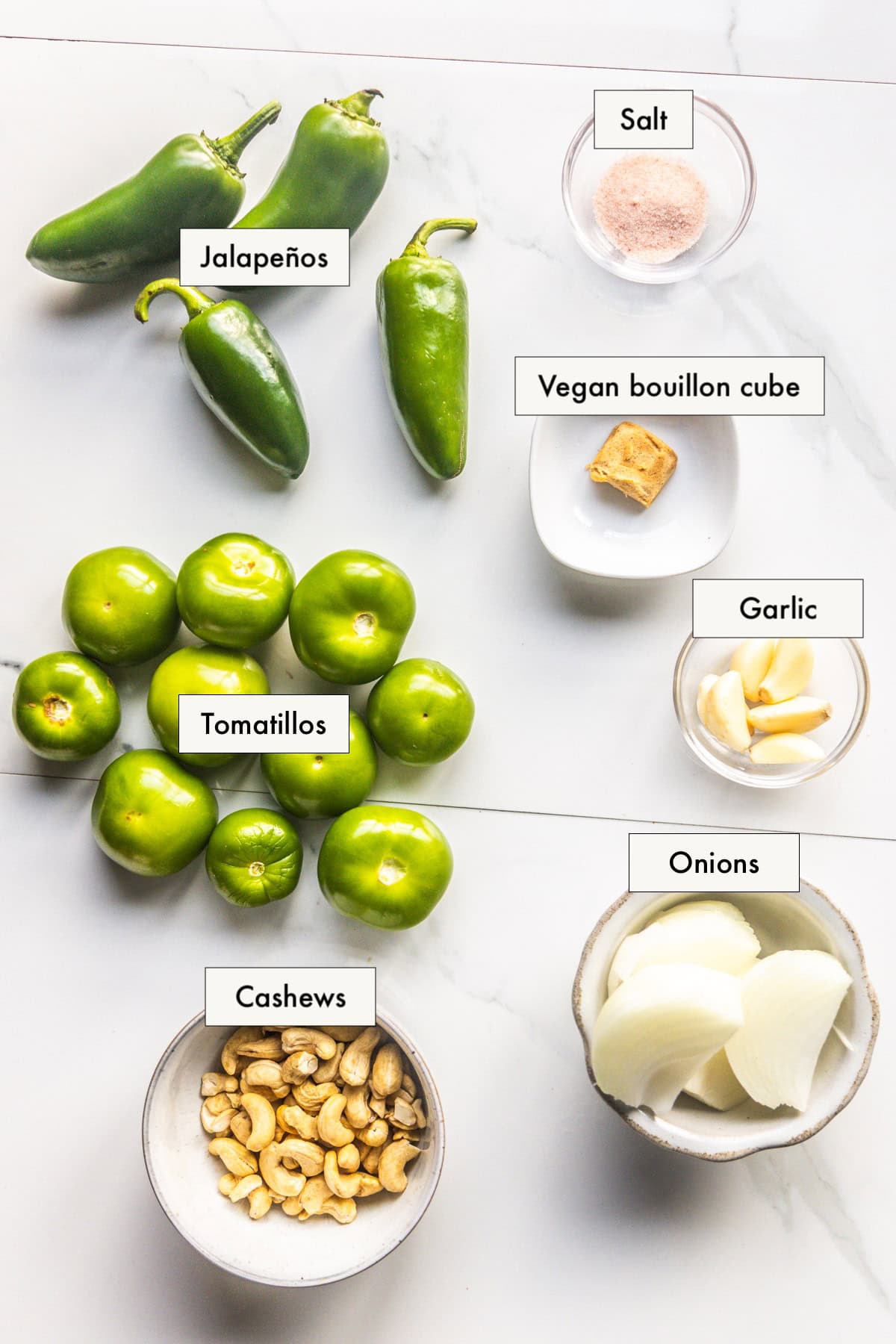 Ingredients for creamy jalapeno sauce in labeled bowls.