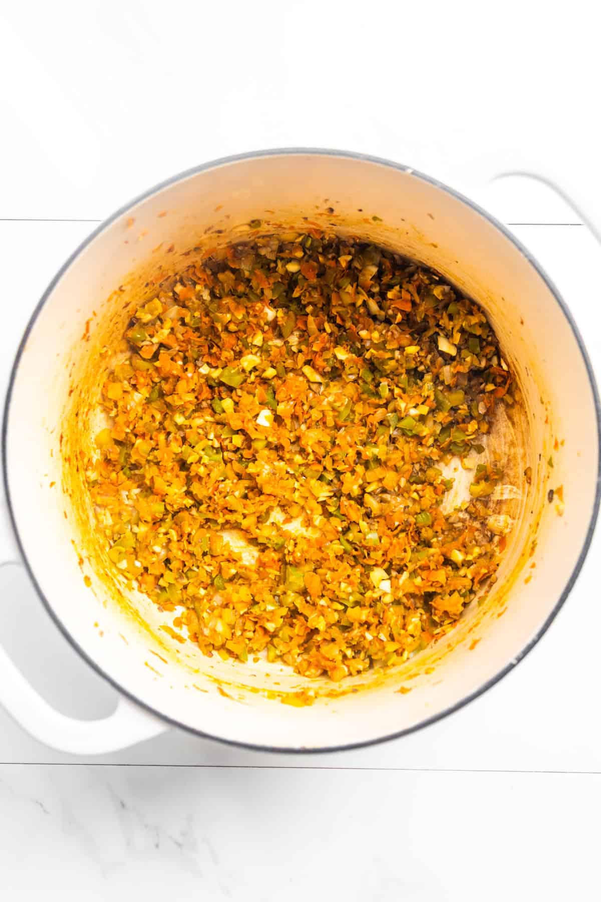 Sautéed veggies in a dutch oven.