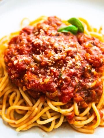 Veg loaded vegan spaghetti sauce served on pasta noodles.