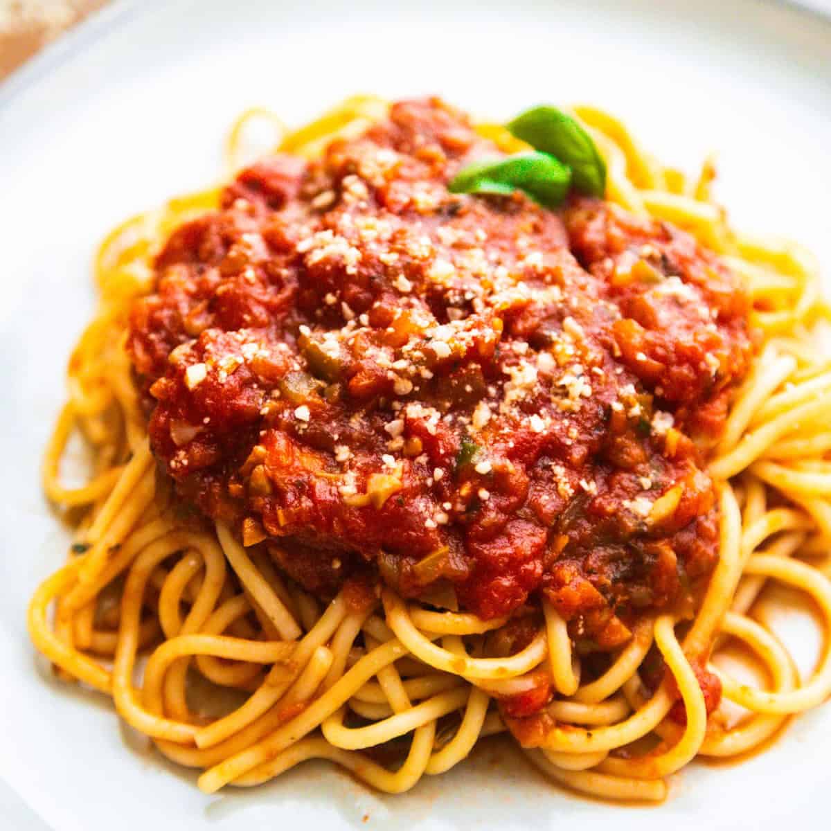 Veg loaded vegan spaghetti sauce served on pasta noodles.