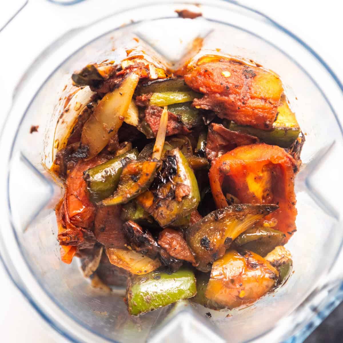 Charred veggies in a blender.