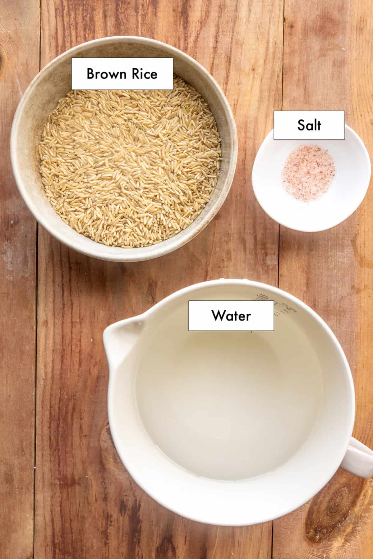 Ingredients to make homemade brown rice on a counter.