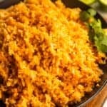 Mexican rice for tacos (simple Mexican rice) in a black bowl.