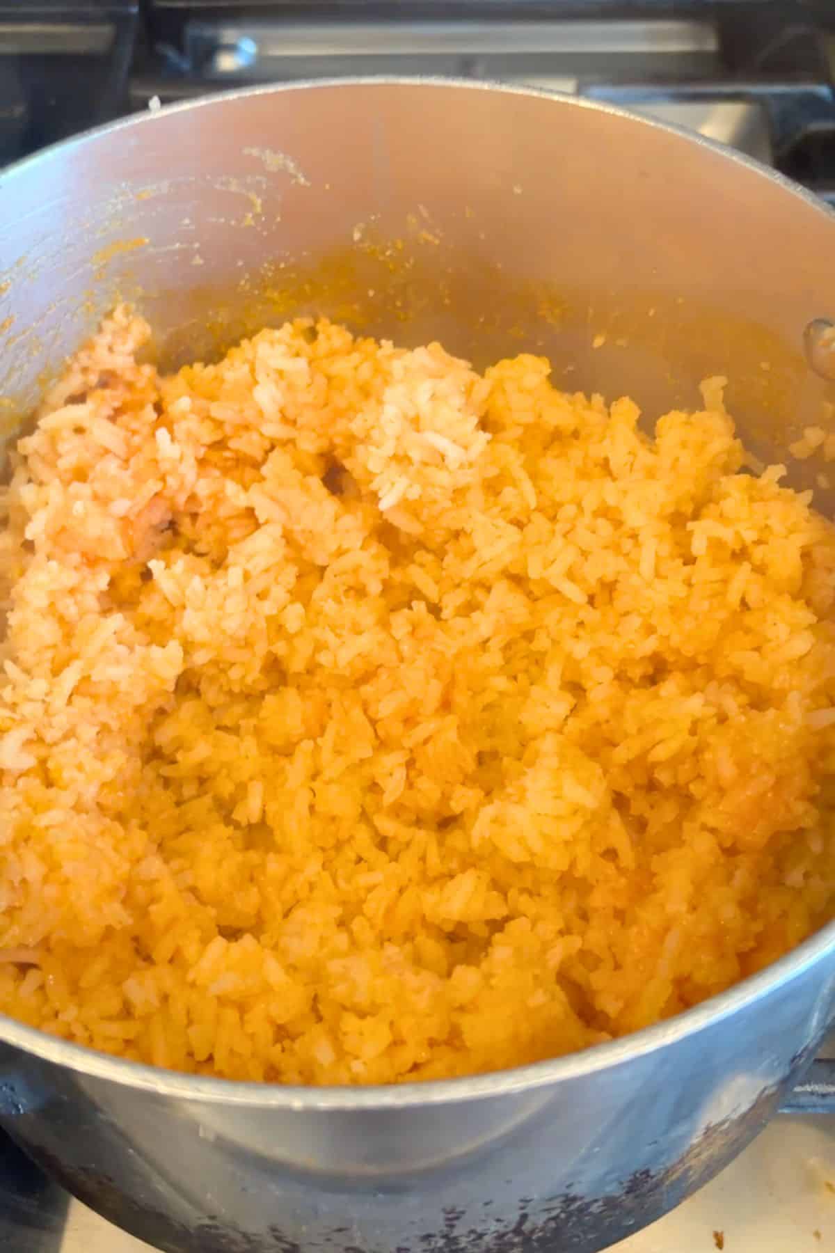 Simple Mexican rice for tacos finished cooking in a pan.