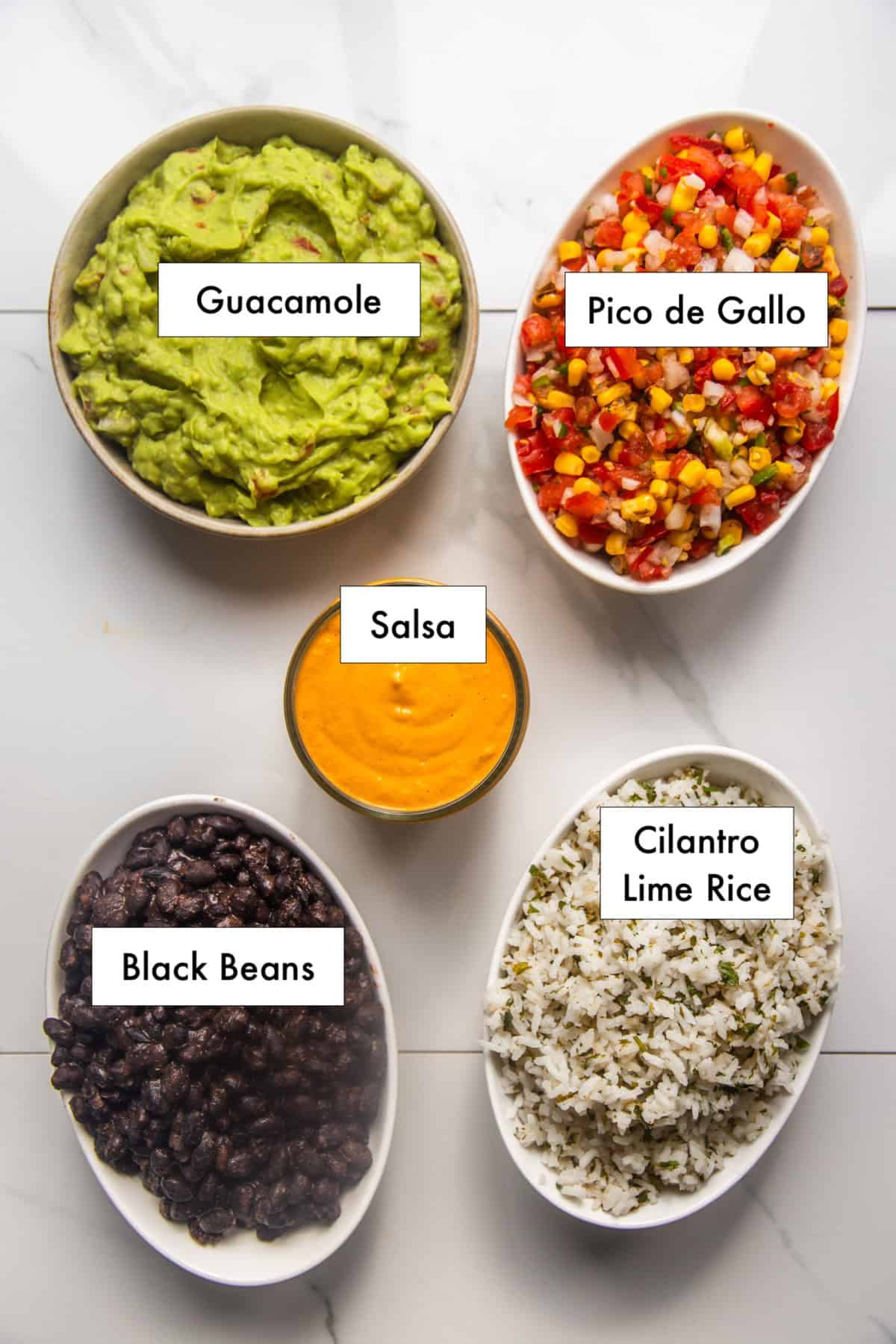 Ingredients for Mexican rice bowl on the counter.