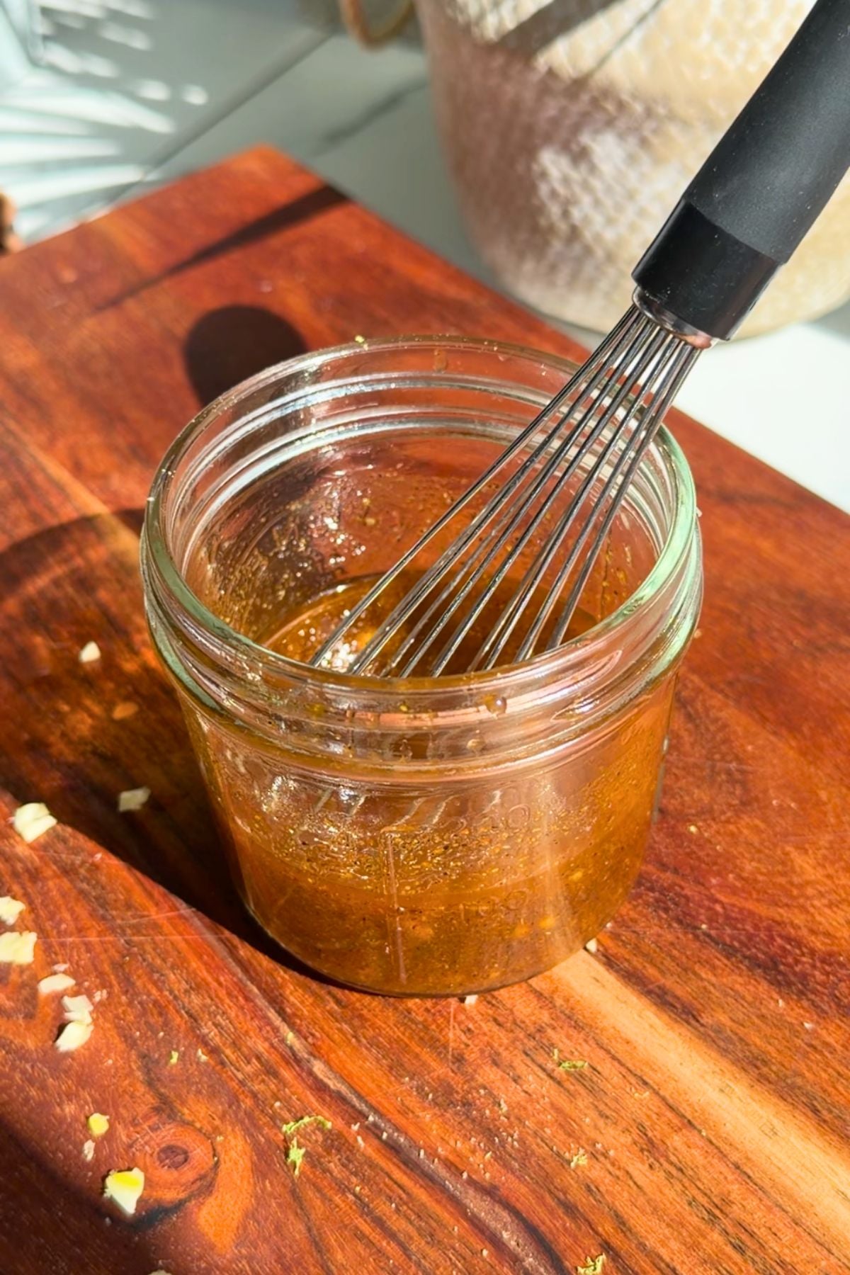 Chili lime vinaigrette mixing in a mason jar.