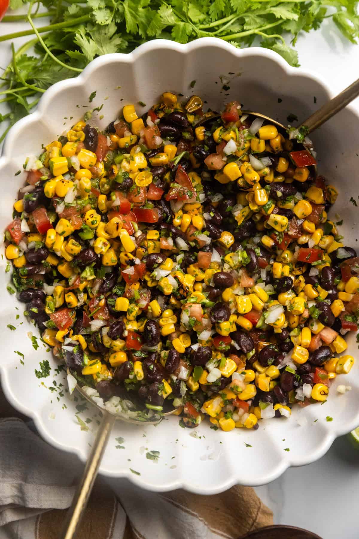Black bean and corn salsa dip in a bowl after mixing.