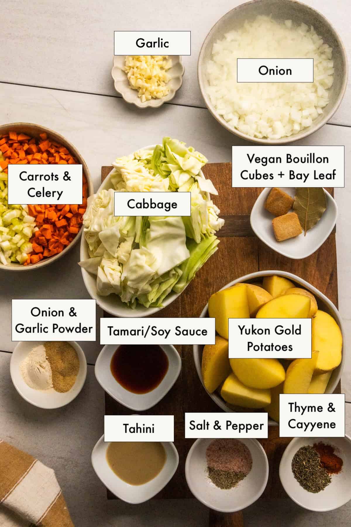 Ingredients for vegan boiled dinner recipe laid out on a counter.